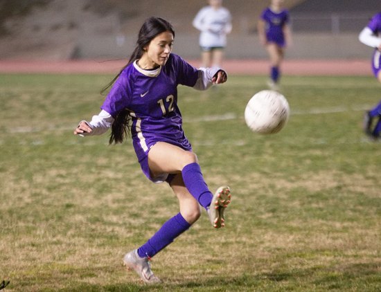 Lemoore's Azucena Yzquierdo-Zaragoza keeps her eye on the ball during Wednesday's (Feb. 2) loss to visiting El Diamante.